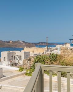 a view of the ocean from the balcony of a house at Astraea in Tripiti