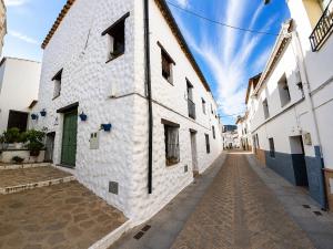 a street in a town with white buildings at Casa Nazari in Benaocaz