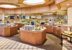 a large kitchen with many counters in a restaurant at LSI Resorts at Ala Moana in Honolulu