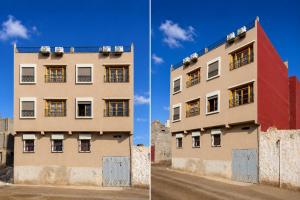 a building next to a dirt road at KASA GUEST Tamraght in Tamraght Ouzdar