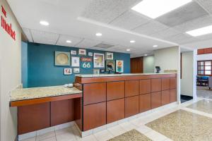 a lobby of a hospital with a reception counter at Drury Inn & Suites Joplin in Joplin +56 photos