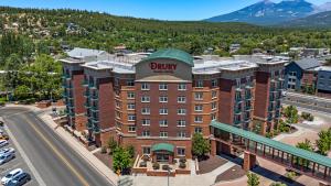 an aerial view of a hotel in a city at Drury Plaza Hotel Flagstaff in Flagstaff
