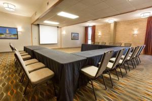 a conference room with a long table and chairs at Drury Inn & Suites Austin North in Austin +25 photos