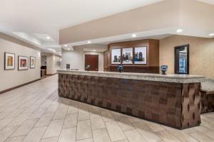 a large lobby with a bar in the middle at Drury Plaza Hotel Columbus Downtown in Columbus +53 photos