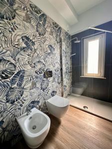 a bathroom with a toilet and a sink and a shower at La Sabinese in Frasso Sabino +50 photos