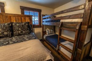 a bedroom with two bunk beds and a bed at Hideaway Above The Stream Sundance, Utah in Sundance