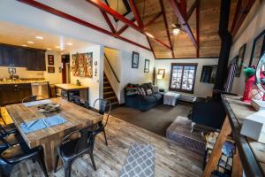 an overhead view of a living room with a wooden table at Hideaway Above The Stream Sundance, Utah in Sundance