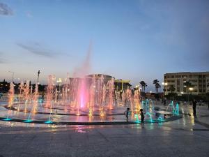 a group of water fountains in a square at appartement in Oujda