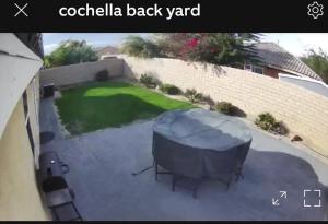 a view of a backyard with a gazebo at Family 4BR Home with Spacious Backyard in Coachella