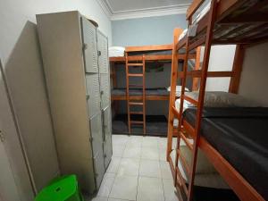 a room with bunk beds and a room with a bunk bed at Casa Art Maison Recife in Recife +3 photos