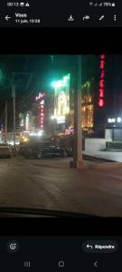 a view of a city street at night with a traffic light at Grand joli F3 Draria 7P in Draria