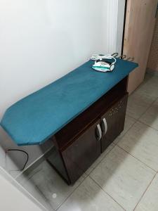 a table with a blue cloth on top of it at Turquesa in Hernandarias