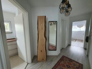 a room with a skateboard leaning against a wall at HomeComfort in Cologne
