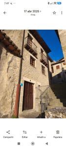 a picture of a building with a door and stairs at Casona de la Tauna in Sos del Rey Católico