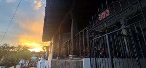 a building with a cafe sign on the front of it at Casa Vielma in Tapalpa +10 photos