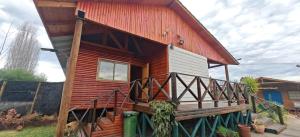 a small house with a red roof at Alojamiento Casa Guadalupe in San Felipe