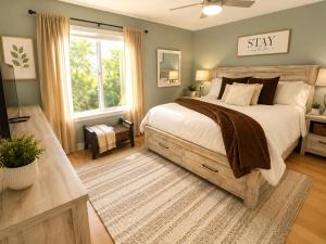 a bedroom with a large bed and a window at Private Beach, 2 Pools & Hot Tub in St. Petersburg +31 photos