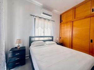 a bedroom with a large bed and a window at Paradise Cove in Punta Cana +34 photos