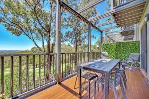 Balcó o terrassa a Villa 3br Tranquility Villa located within Cypress Lakes Resort
