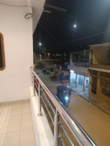 a view of a building from a balcony at night at Housing in Mancora in Máncora