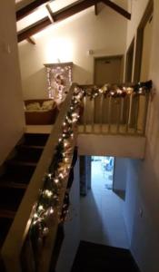 a staircase with lights on the side of a house at Hotel Jade Imbanaco in Cali