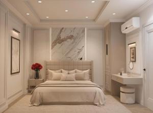 a bedroom with a large bed and a sink at My Eliana Luxury Hotel Saigon Saigon & Spa in Ho Chi Minh City +74 photos