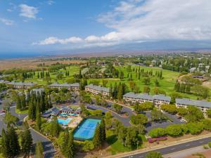 an aerial view of a resort with a pool at Paniolo Greens Resort in Waikoloa