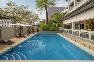 an image of a swimming pool at a hotel at Courtyard by Marriott Darwin in Darwin