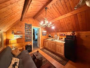an overhead view of a kitchen in a log cabin at The Dapper Duck Log Cabin in Cosby