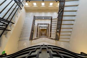 an overhead view of a staircase in a building at Meliá Genova in Genoa