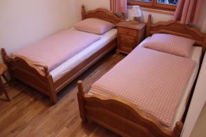 Postel nebo postele na pokoji v ubytování Haus Rathore