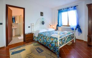 a bedroom with a bed and a bathroom with a sink at Oasi Di Cocciola in Badia Tedalda +22 photos