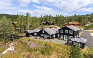 an aerial view of a house on a hill at Gamatun cabin in Heimdal
