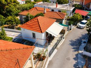 an aerial view of a house with orange roofs at Elaia & Nyx Residence in Volos
