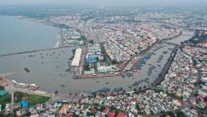 an aerial view of a city with a harbor at maison Ty Homestay in Phan Thiet