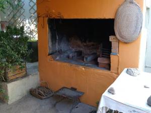 a brick oven in the side of a building at The Rose and Olive in Cradock