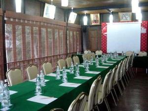 a conference room with a long table and chairs at Baan Talay Dao Resort in Hua Hin +190 photos