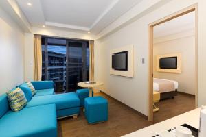 TV a/nebo společenská místnost v ubytování Savoy Hotel Boracay Newcoast