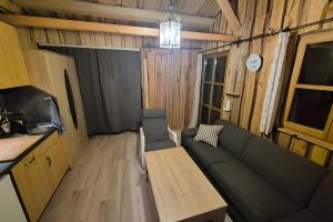 O bucătărie sau chicinetă la Uriges Tinyhaus