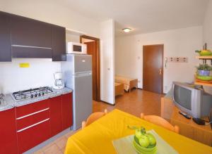 A kitchen or kitchenette at Residence Valbella