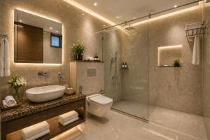 a bathroom with a toilet and a sink and a shower at Hotel Prak Tree Sector 20 Noida in Noida