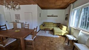 a living room with a couch and a table at Apartment Gms in Schottwien