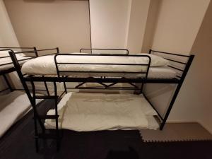 a room with two bunk beds in a room at Nagoya - Hotel - Vacation STAY 01596v in Nagoya
