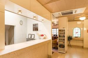 a large room with a counter in a room at Nagoya - Hotel / Vacation STAY 19141 in Nagoya