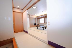 a hallway with a room with a table in it at Hashima - Hotel - Vacation STAY 52732v in Hashima