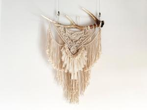 a pair of fringe earrings hanging on a wall at Cactus Inn / Vacation STAY 51549 in Miyazaki