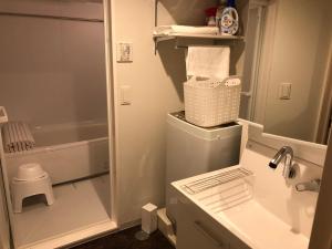 a bathroom with a shower and a sink and a tub at Time - Vacation STAY 18884v in Kagoshima