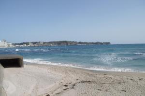 a sandy beach with the ocean in the background at Amami - Vacation STAY 83858 in Katsuura +7 photos