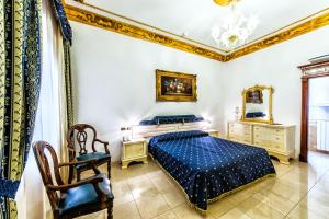 Postel nebo postele na pokoji v ubytování Euro Hotel Iglesias
