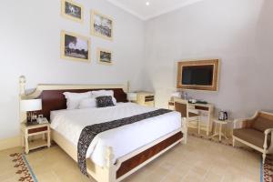 Cama o camas de una habitación en Java Villas Boutique Hotel & Resto